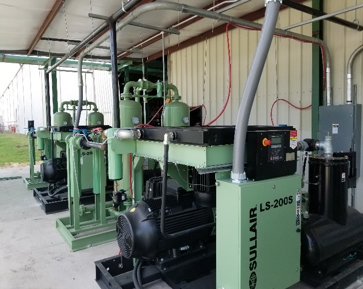 Outdoor unit of air compressors on an industrial site