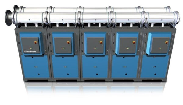 The HES Series Refrigerated Air Dryer features four blue control panels and several cylindrical metal pipes on top.
