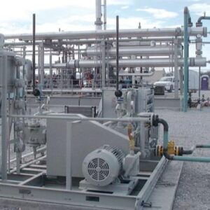 Pressure Boosting Solutions unit with multiple pipes and machinery, installed outdoors on a gravel surface.