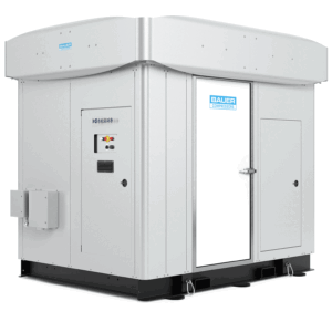 A large white BAUER I-SERIES III industrial equipment enclosure with access doors and control panels.